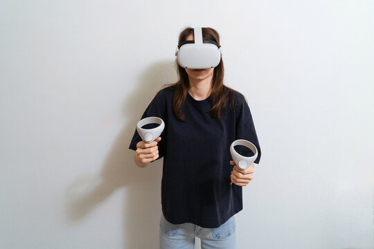 girl in viar glasses, virtual reality glasses on a white background
