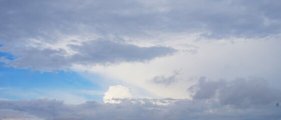 The sky is cloudy with black clouds clumping together, creating a dramatic sky atmosphere