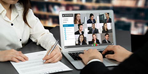 Business people on video conference for brisk virtual group meeting of corprate business office...