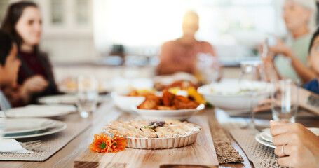 Love, food and lunch with big family in dining room for bonding, hungry and nutrition. Support, happiness and grandparents with child and parents eating at home for relax, conversation and health