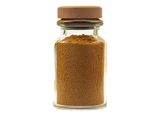 ground cumin powder in transparent glass bottle