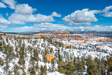 Panorama landscape of pinnacles of Bryce Canyon National Park covered in snow, Utah USA