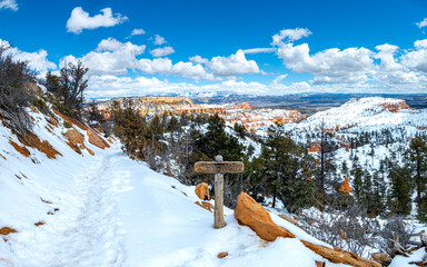 Panorama landscape of pinnacles of Bryce Canyon National Park covered in snow, Utah USA