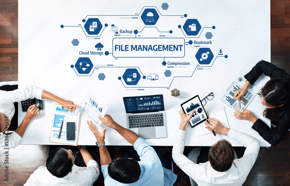 Poster a diverse team collaborates on file management strategies, utilizing technology and data visuals to 