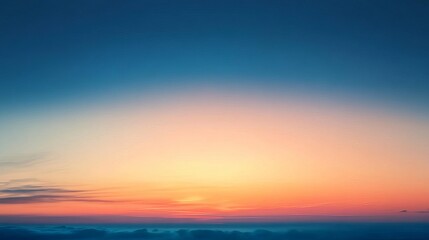 Obraz premium Abstract Gradient Sunrise in the Sky: Soft Blues & Warm Golden Hues