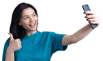 Portrait of a pretty girl taking a selfie isolated over grey background