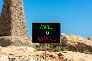 Agree to disagree symbol. Concept words Agree to disagree on beautiful blackboard. Beautiful brown...
