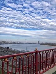 Pedestrian bridge with a view of the Dnieper river 