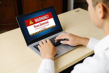 Virus warning alert on computer screen detected modish cyber threat , hacker, computer virus and malware