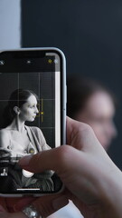 Portrait of a beautiful young girl on a dark studio background. Beautiful natural woman posing for the camera