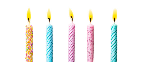 Birthday candles with flames against a black backdrop, cut out transparent