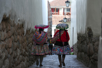 Traditional Peruvian Women (Cholas) in Cusco's Historic Streets