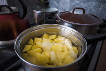 Cooking potatoes, in the kitchen. Dinner

