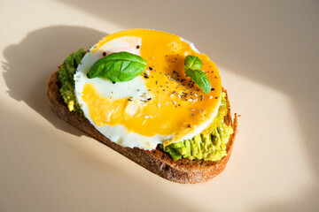 Bruschetta with egg, avocado and herbs