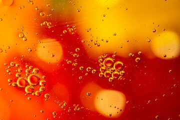 Oil and water, abstract background yellow and ginger color, Space for text.