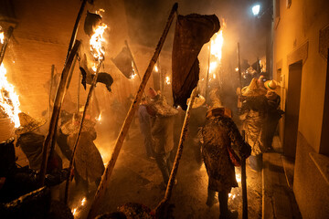 young people holding torches during the celebration of el vitor, in the town of mayorga, Valladolid on september 27 as every year.