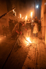 young people holding torches during the celebration of el vitor, in the town of mayorga, Valladolid on september 27 as every year.
