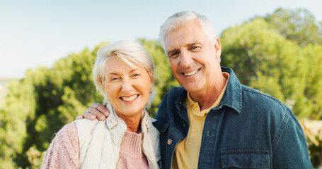 Outdoor, old couple and portrait with hug for love, bonding together and connection in healthy relationship. Nature, man and woman with smile for embrace, senior marriage and care on weekend holiday