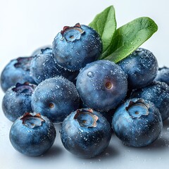 Obraz premium Fresh Juicy Blueberries with Green Leaves Close Up Shot