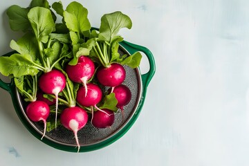 Fresh Red Radishes in Green Colander, Top View