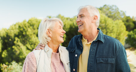 Outdoor, old couple and laughing with hug for love, bonding together and connection in healthy relationship. Nature, man and woman with smile for embrace, senior marriage and care on weekend holiday