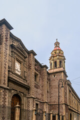 Temple of the former convent of La Encarnacion (Templo del ex convento de la Encarnacion) with two marble reliefs representing Annunciation and Martyrdom of San Lorenzo. Mexico City, Mexico.
