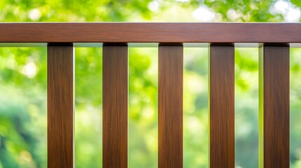 Obraz premium Modern Brown Wooden Fence Railing Green Blurred Background