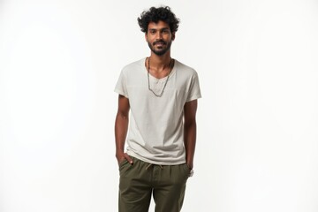 Fototapeta premium Half-Length (Waist-Up) portrait of young stylish smiling Sri Lankan male model in hippie wear isolated on pure white background looking at camera