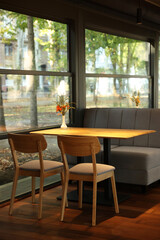 Stylish cafe with large windows. Interior design