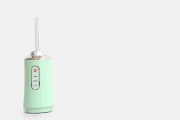 Oral irrigator on white background