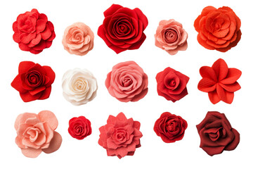 Assorted decorative textile flowers on a black background, cut out transparent