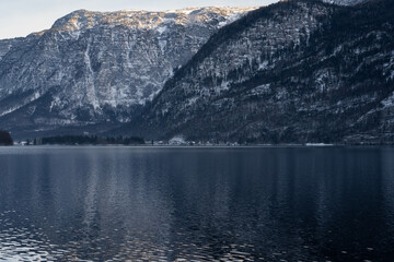 Bright sunny winter day, Alps, Hallstatt lake and village view.