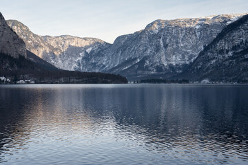 Bright sunny winter day, Alps, Hallstatt lake and village view.