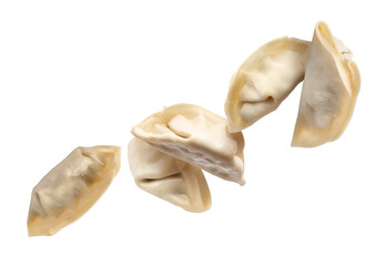 Uncooked gyoza in air on white background