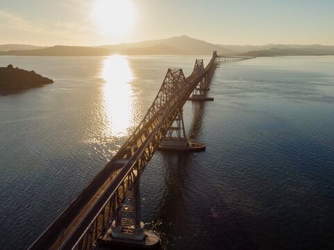 Cars travel across the Richmond-San Rafael Bridge, connecting Richmond and San Rafael, California, USA. The bridge facilitates transportation and commerce in the Bay Area.