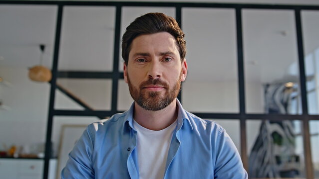 Man tutor talking online meeting video call sitting home office closeup pov view