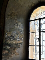 old window in a brick wall