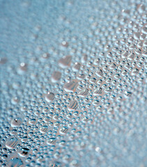 Water Condensation Small Bubbles Moisture on a Glass Window Close up Abstract Background