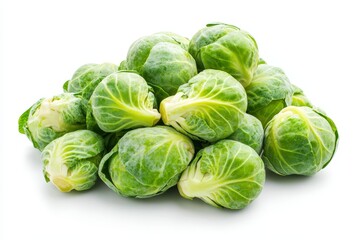 Fresh Brussels sprouts pile on white (2)