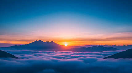 Fototapeta premium Sunset mountain view over a sea of clouds