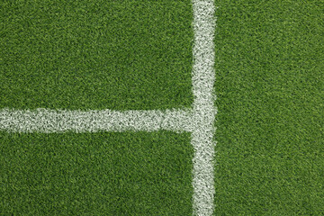 Football field with markings on green turf