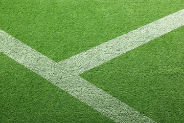 Football field with markings on green turf