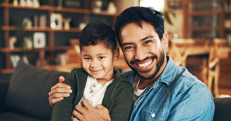 Couch, father and child in portrait for hug, connection and bonding together as family at home. Sofa, smile and dad with happy boy for love embrace, relationship and relax on weekend holiday in house