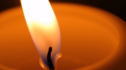 Close-Up High-Resolution Stock Photo of a Flickering Candle Flame with Shallow Depth of Field
