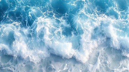 Obraz premium Crashing ocean waves creating white foam on turquoise water surface