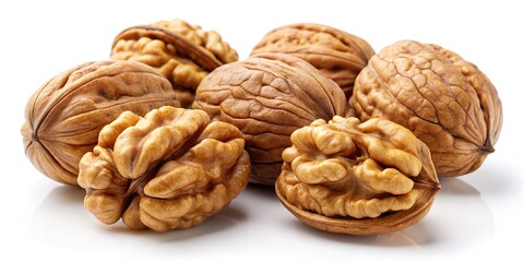 A Collection of Shelled and Unshelled Walnuts on White Background Showing Texture and Detail