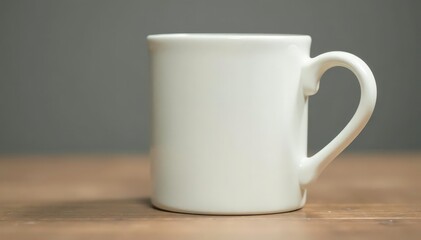 Obraz premium Classic white ceramic mug, handle detail visible , mockup, template, morning