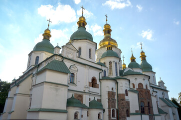 Exterior of St. Sophia's Cathedral in Kyiv, Ukraine. The white-walled cathedral features multiple...