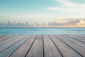 Fototapeta premium A serene wooden deck overlooking calm ocean under pastel sky with soft clouds, evoking peace and relaxation