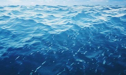 Obraz premium Ocean waves surface view under blue sky in the background. For travel, nature, and relaxation use